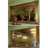 A late 19th century gilt overmantle mirror; and another gilt overmantle mirror with reeded