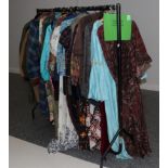 Quantity of assorted ladies and gents clothing, including gents dressing robes and coats, duffle