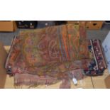 Two 19th century paisley shawls; and two 20th century machine woven pelmets (4)