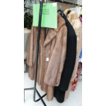 A Dyson's Leeds pastel mink coat, another in light brown coney fur, Rodex camel coloured overcoat