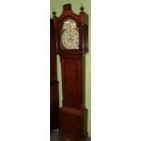 An eight day oak and mahogany longcase clock, arch painted dial, case with a pagoda pediment