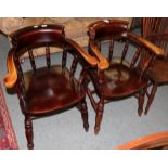 A pair of smokers bow armchairs