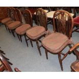 A composite set of six spindle back dining chairs