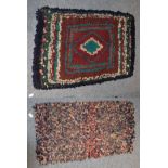 Wool rag rug with central lozenge surrounded by coloured frames, and another smaller (2)