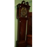 An oak eight day longcase clock, the arch brass dial with circular disc in the arch bearing a