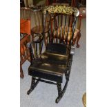 Swedish painted black spindle back rocking chair