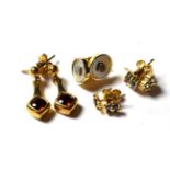 Two pairs of 9 carat gold sapphire cluster stud earrings; a pair of mother-of-pearl and diamond stud