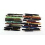 A small group of fountain and other pens including Waterman and Sheaffer, six with nibs stamped