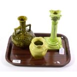 A Burmantofts Faience pottery candlestick, lime glaze, impressed factory mark and 1198, 21cm; a