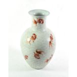 A Chinese porcelain carved vase decorated with fish