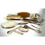 A collection of silver for the dressing-table, some pieces by William Aitken, Birmingham, each piece