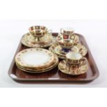 Royal Crown Derby Imari pattern tea cups and saucers, coffee cans and saucers, and six other plates