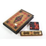 Third Reich book-form backgammon board, the counters with swastika emblem; and a cribbage board
