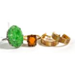 A jade ring, stamped '18CT', finger size K1/2; a gem set ring, stamped '9CT', finger size L1/2;