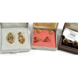 A pair of 9 carat gold earrings, clip fittings; two pairs of earrings, one pair stamped '9CT' the