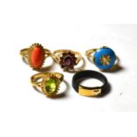 A seed pearl and blue enamel ring, stamped '15CT', finger size L; a 9 carat gold garnet cluster