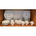 A Royal Copenhagen part dinner service including dinner plates, side plates, oval twin handled