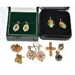 Three 9 carat gold gem set pendants; together with a pair of 18 carat gold amethyst stud earrings;