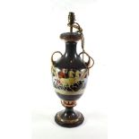 A 19th century Staffordshire twin-handled vase converted into a lamp (adapted for electricity)