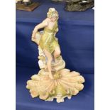 A Royal Dux centrepiece figure, female bather stepping into giant clam shell, marked to base