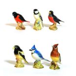 Beswick Birds Comprising: Baltimore Oriole, model No. 2183, Blue Jay, model No. 2188, Cedar Waxwing,