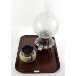 Royal Doulton stoneware table oil lamp, with glass reservoir and shade; together with a footed