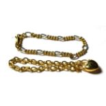 A 9 carat two colour gold figaro link bracelet, length 19.5cm and a 9 carat gold trace link and