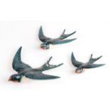 Beswick Swallow Wall Plaques, model No. 757 - 1, 3 and 5, all blue gloss (3) . Minor chip to the tip