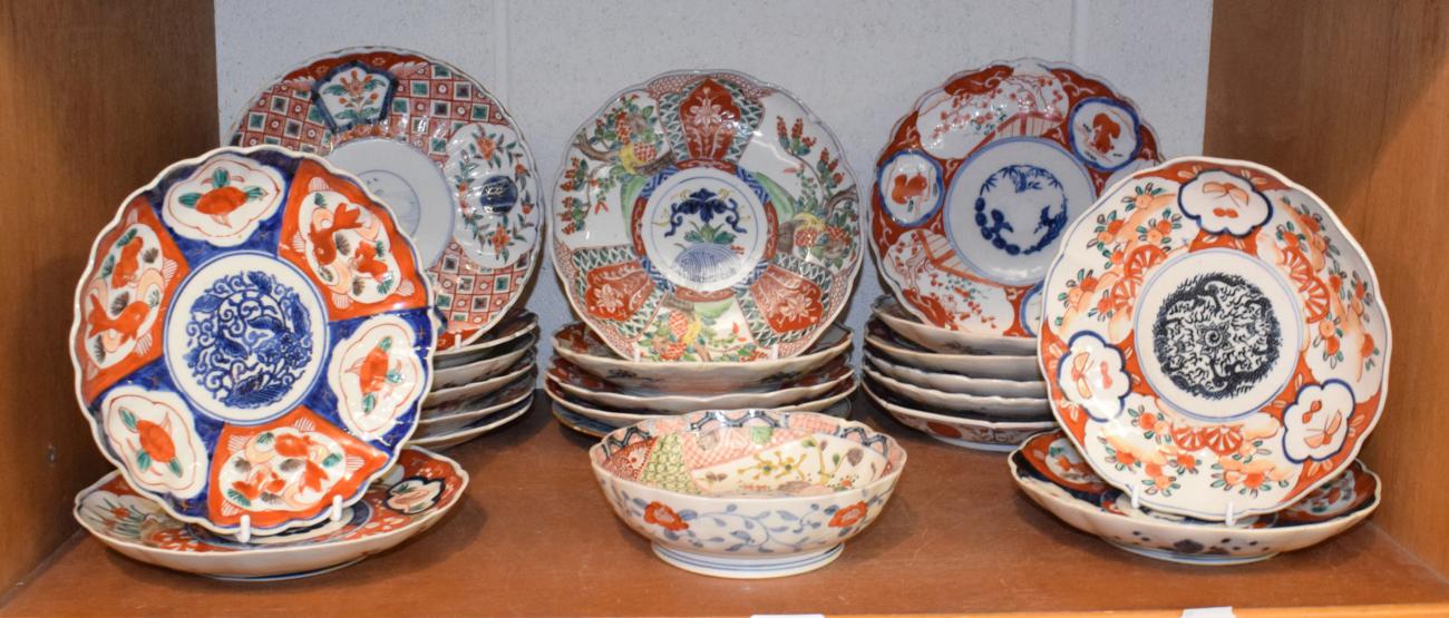 A quantity of 19th century and later Japanese Imari plates and bowls