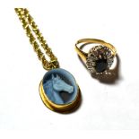 A cameo pendant stamped '750' on a fancy link chain clasp stamped '375', chain length 61cm; together