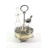 A George III silver cruet-frame, circular and on three ball and claw feet, with openwork and