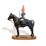 Beswick Connoisseur 'Blues and Royals', model No. 2582, black matt, on wooden plinth