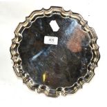 A George V silver salver, by Thomas Bradbury and Sons Ltd., London, 1912, shaped circular and on