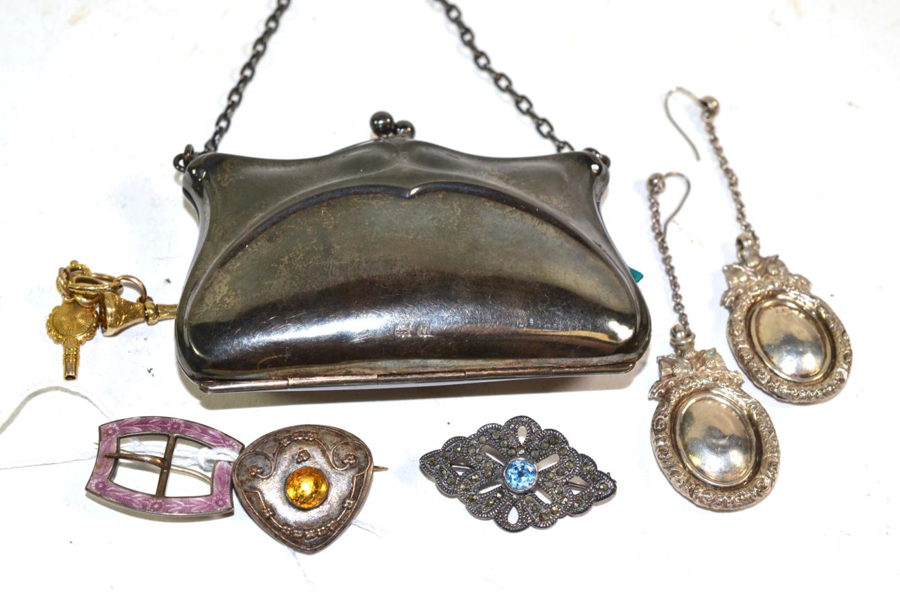 A yellow stone set brooch, stamped 'DEPOSE', a silver finger purse, a seal fob watch key and heart