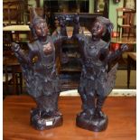 A pair of Indonesian carved wooden deities