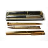 A Wahl rolled gold lever pencil; a silver Yard o' Lead lever pencil, hallmarks for London 1929; a US