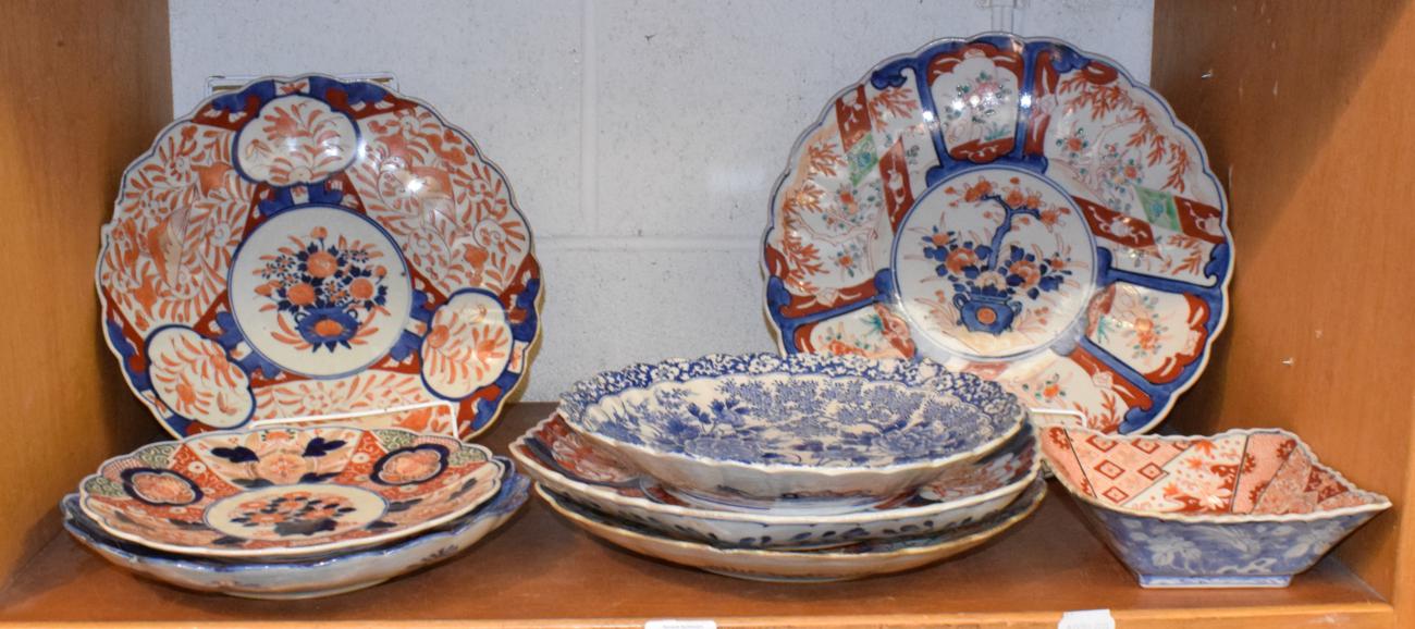 19th century Japanese porcelain including four Imari chargers, similar plate, a blue and white