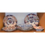 19th century Japanese porcelain including four Imari chargers, similar plate, a blue and white