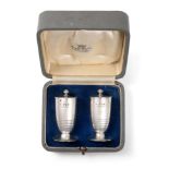 A Pair of George VI Silver Pepperettes, by Charles Boyton, London, 1938, each tapering and on