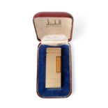 An Elizabeth II Gold Dunhill Cigarette Lighter, maker's mark HW, London, 1965, 9ct, retailed by