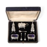 A George V Silver Condiment-Set, by the Goldsmiths and Silversmiths Co. Ltd., London, 1920 and 1920,
