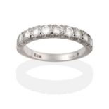 A Diamond Half Hoop Ring, ten round brilliant cut diamonds in white claw settings to a tapering