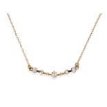 A Diamond Necklace, of a curved panel set with seven old cushion cut diamonds in yellow claw