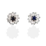 A Pair of 18 Carat White Gold Sapphire and Diamond Cluster Earrings, the round brilliant cut