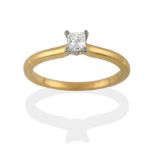 An 18 Carat Gold Diamond Solitaire Ring, the princess cut diamond in a white four claw setting on