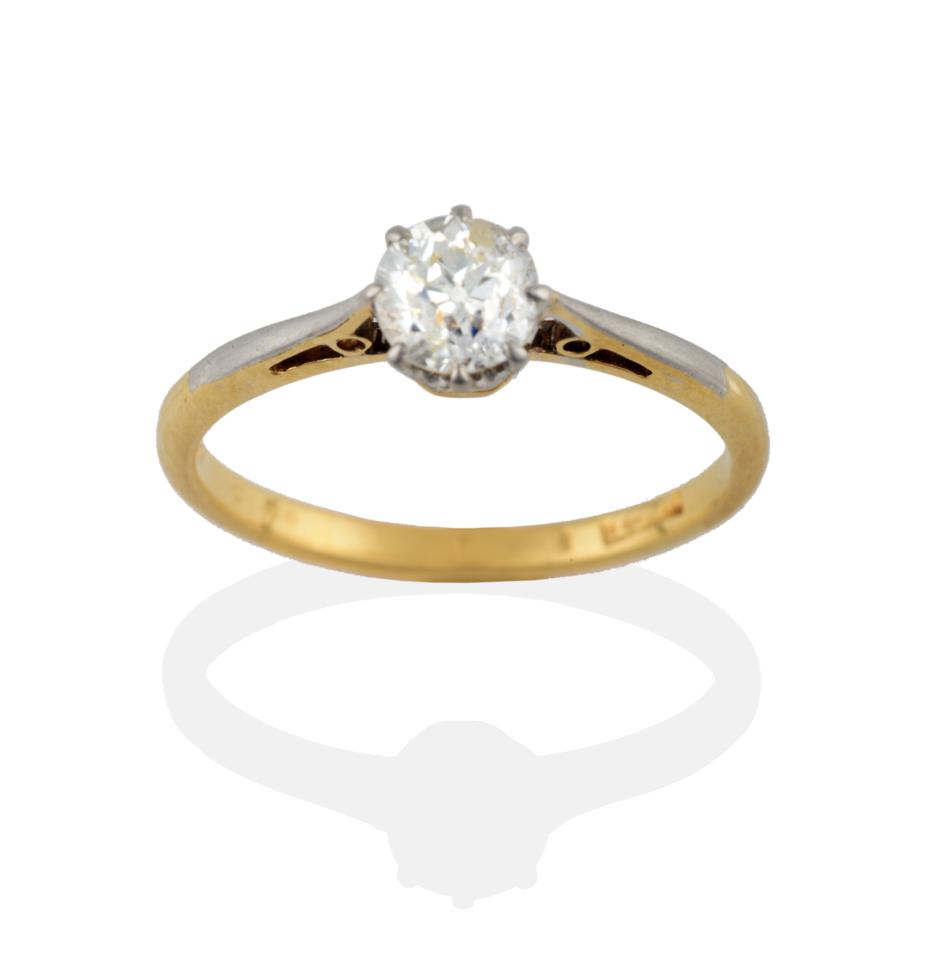 An Early 20th Century Diamond Solitaire Ring, the old cut diamond in a white claw setting, to