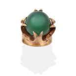 A 9 Carat Gold Green Chalcedony Ring, the cabochon green chalcedony in a fancy yellow claw setting