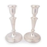 A Pair of Elizabeth II Silver Candlesticks, by Carrs, Sheffield, 2005, each on circular base with