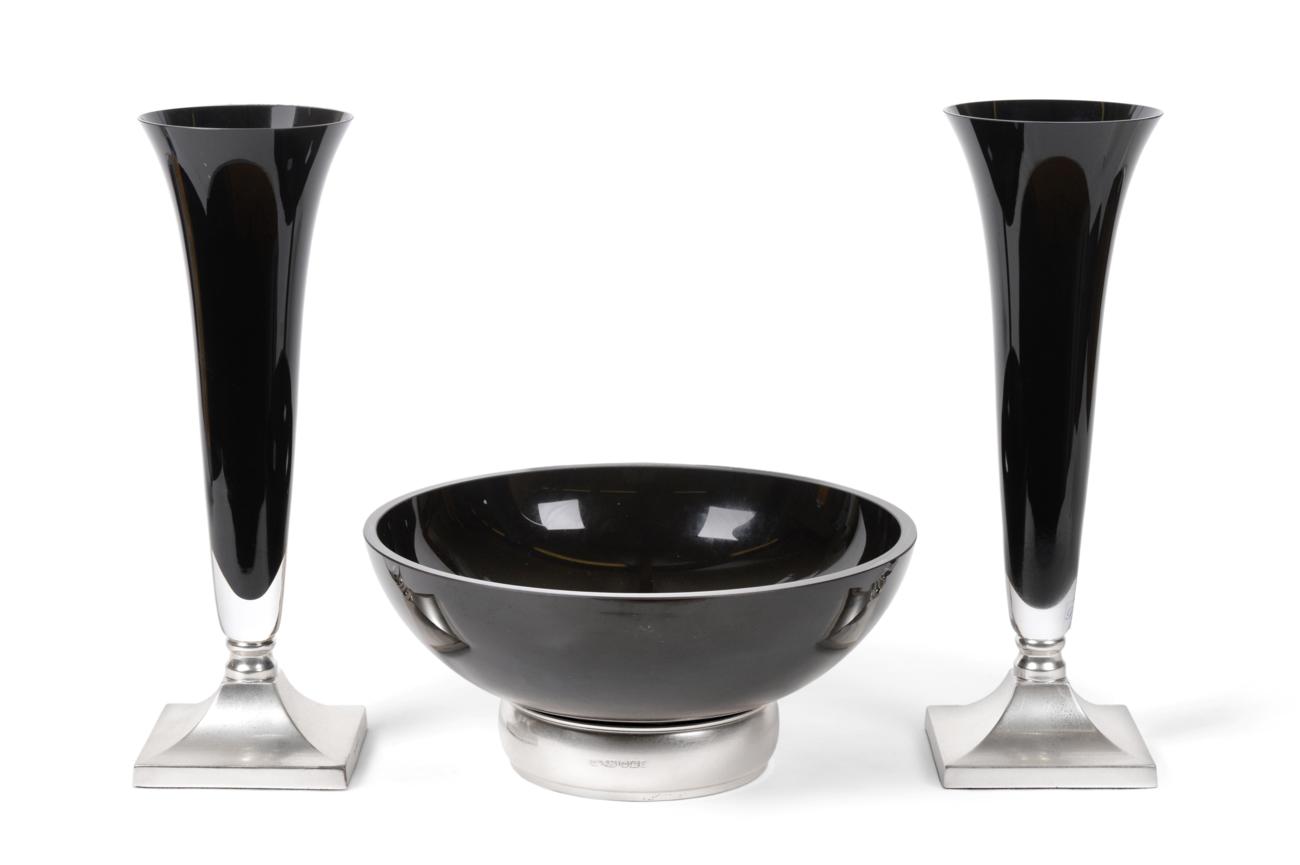 A Three-Piece Elizabeth II Silver-Mounted Black Glass Table Garniture, The Silver Mounts by Broadway