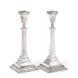 A Pair of George V Silver Candlesticks, by Britton, Gould and Co., Birmingham, 1932, on stepped